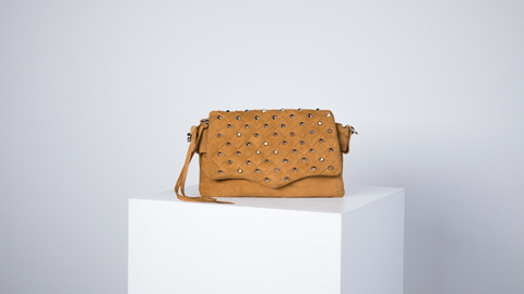 Lola Suede and leather knot clutch